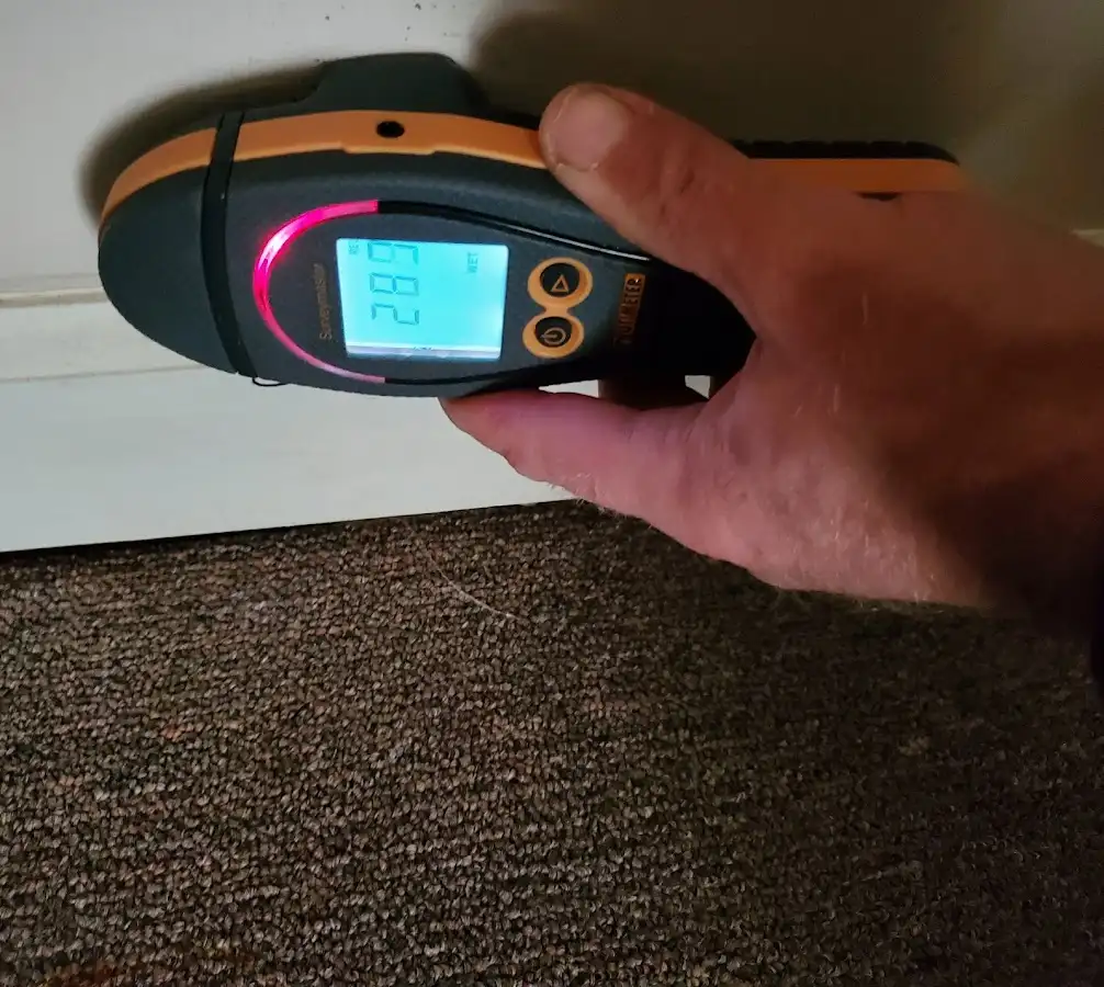 Moisture detection at baseboard during Burst Pipe Cleanup in South San Jose Hills